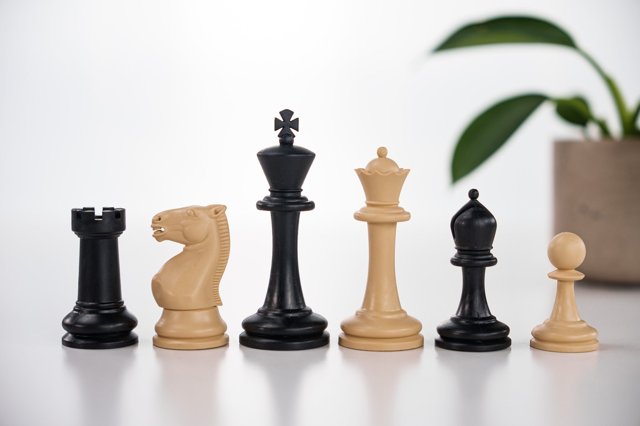 3 7/8" Plastic Staunton Club Chess Pieces - Black and Tan Questions & Answers